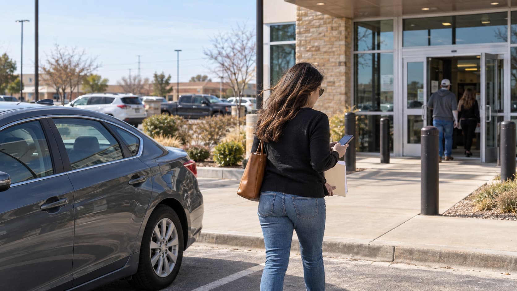 Driver arriving at an Oklahoma City tag office with vehicle registration documents